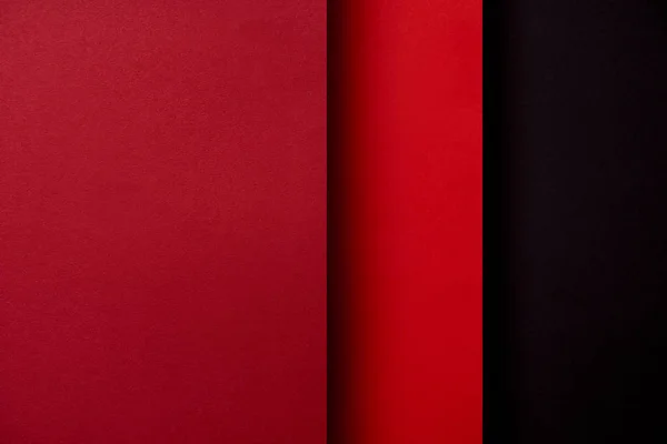 Fondo abstracto con hojas de papel en tonos rojos - foto de stock