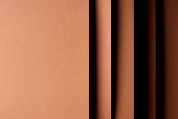 Fond abstrait avec feuilles de papier dans les tons marron — Photo de stock