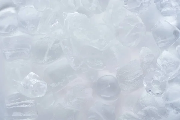 Vista de cerca del fondo de los cubitos de hielo congelados - foto de stock