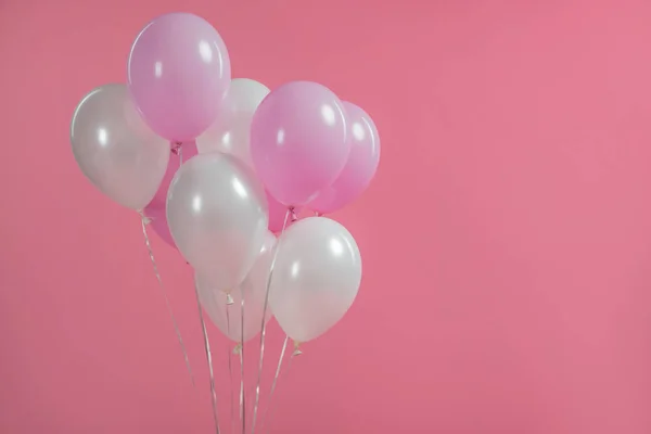 Surprise party decoration with balloons isolated on pink — Stock Photo