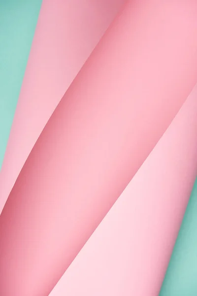 Beau fond abstrait créatif en papier rose et turquoise — Photo de stock