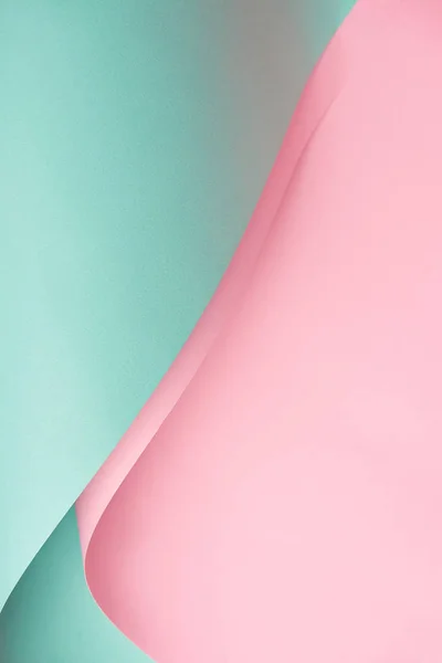 Close-up view of beautiful creative abstract pink and turquoise paper background — Stock Photo