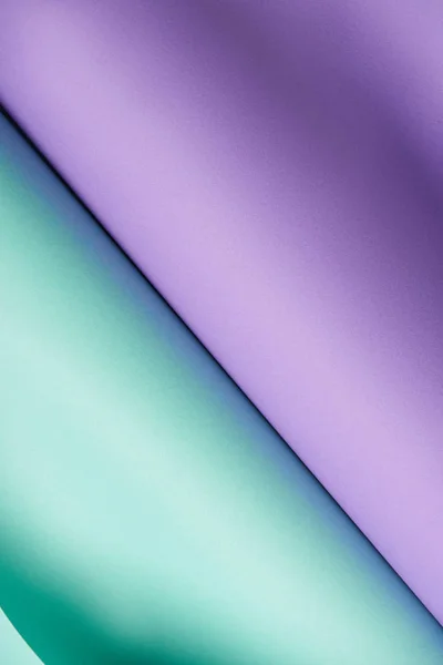 Beau fond abstrait en papier texturé violet vif et turquoise — Photo de stock