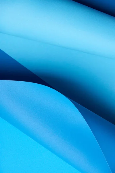 Vista de primer plano de fondo de papel abstracto azul brillante creativo - foto de stock