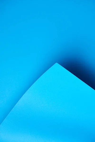 Close-up view of beautiful bright blue abstract paper background — Stock Photo