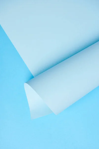 Vista de primer plano del fondo de papel abstracto azul claro - foto de stock