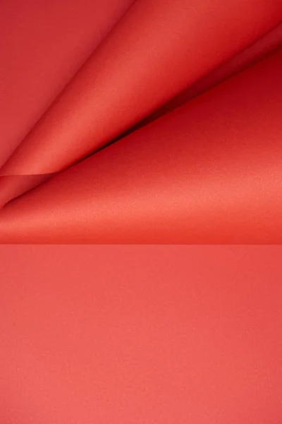 Vue rapprochée du fond abstrait de papier créatif rouge — Photo de stock