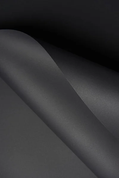 Vista de primer plano del fondo abstracto de papel creativo negro - foto de stock