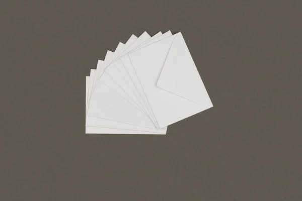 Close-up view of white closed letters isolated on grey background — Stock Photo