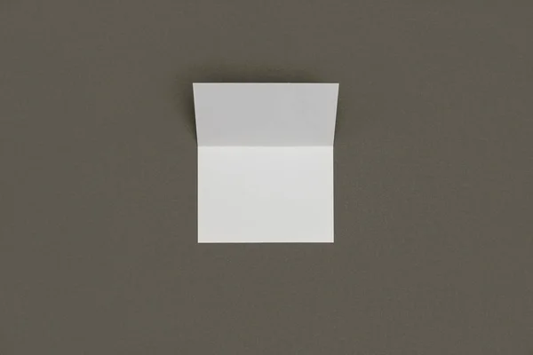 Top view of blank white card isolated on grey background — Stock Photo