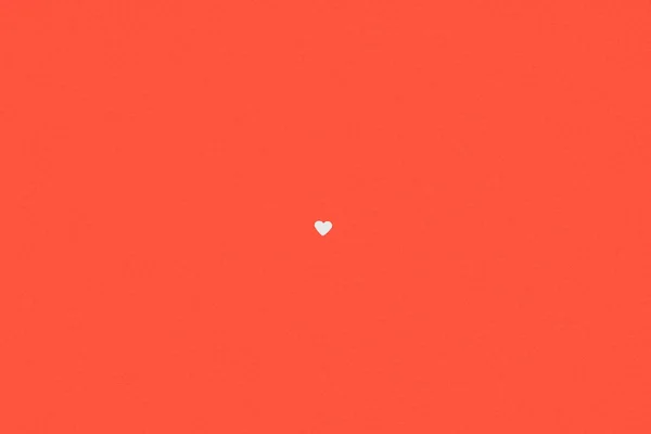 Petit symbole de coeur blanc isolé sur fond rouge — Photo de stock