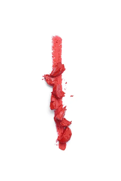 Top view of smashed red lipstick on white background — Stock Photo