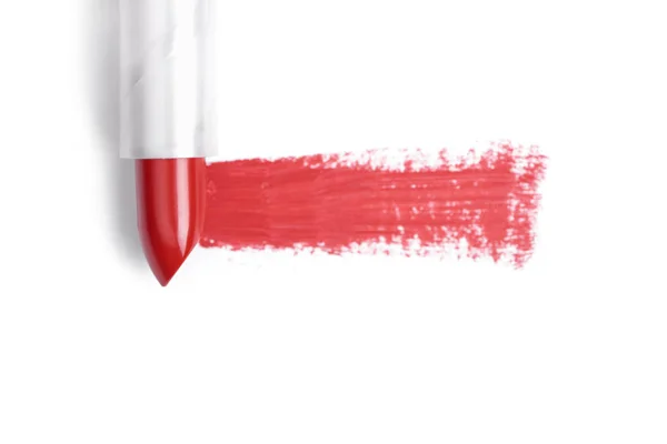 Draufsicht auf roten Lippenstift auf weißem Hintergrund — Stockfoto