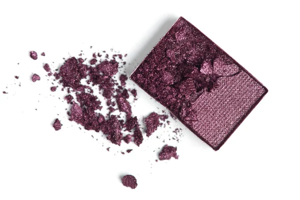 Top view of cracked purple eyeshadow on white backdrop — Stock Photo