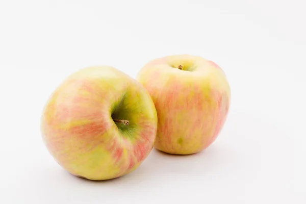 Ripe golden delicious apples on white background — Stock Photo