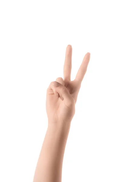 Частичный взгляд женщины, показывающей номер 2 в языке жестов изолированы на белом — стоковое фото