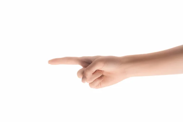 Vue partielle de la femme pointant vers la gauche avec le doigt isolé sur blanc — Photo de stock