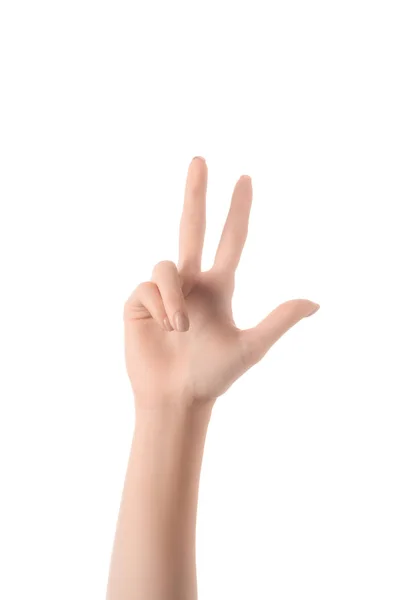 Partial view of woman showing number 3 in sign language isolated on white — Stock Photo