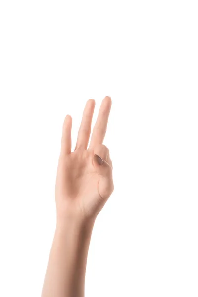 Vista ritagliata della donna che mostra la lettera F in linguaggio sordo e muto isolato sul bianco — Foto stock