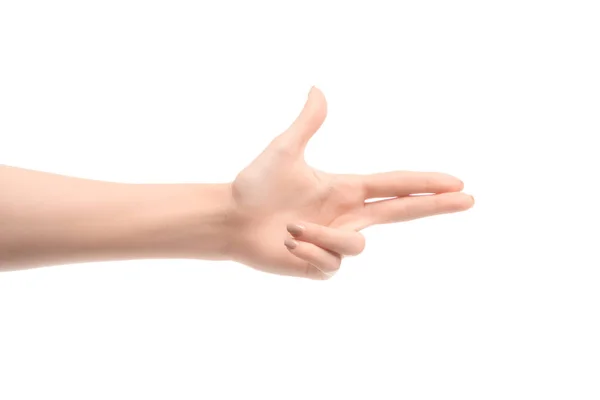 Vista recortada de la mujer haciendo gesto de arma con las manos aisladas en blanco — Stock Photo