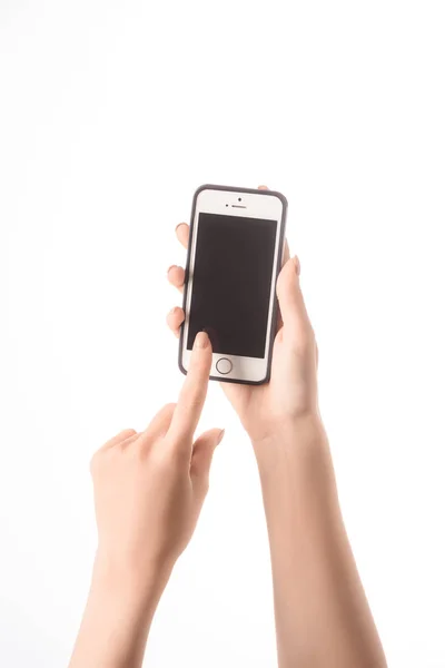 Cropped view of woman using smartphone with blank screen isolated on white — Stock Photo