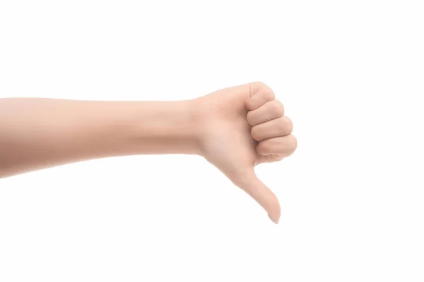 Обрезанный вид женщины, показывающей палец вниз знак изолирован на белом — стоковое фото