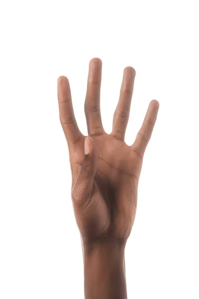 Vista parcial del hombre afroamericano mostrando el número 4 en lenguaje de señas aislado en blanco — Stock Photo