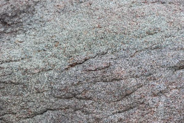 Vue rapprochée de la surface en pierre grise texturée — Photo de stock