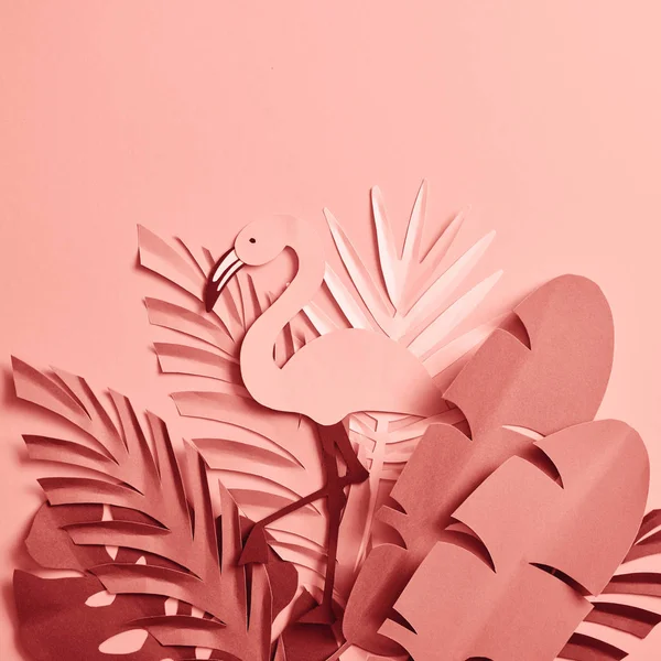 Bunch of paper cut palm leaves and flamingo on pink background — Stock Photo