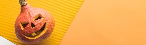 Top view of carved spooky pumpkin, panoramic shot — Stock Photo