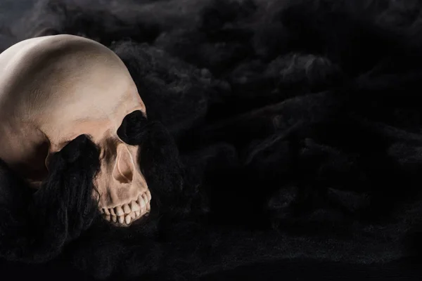 Spooky human skull with black dark clouds and copy space, Halloween decoration — Stock Photo