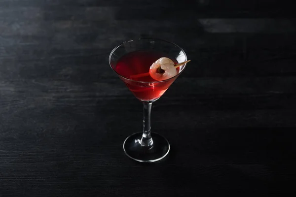 Red decorated Halloween cocktail on black background — Stock Photo