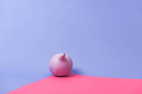 Pastel painted pumpkin on violet and pink background — Stock Photo