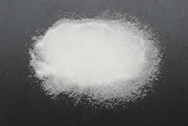 White Sweet Flour on Black Background - Free Space for text. Healthy,