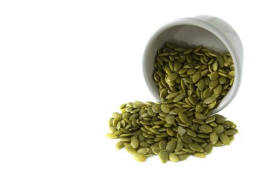 İzole kopya alanı kase kabak çekirdeği. Sağlıklı vejetaryen yemek. Süper yiyecek, Kahvaltı veya aperatif.