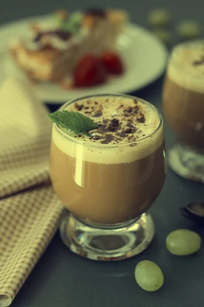 Coffee cold drink with vanilla ice cream and espresso. Deliciouse summer refreshing drink in glass.