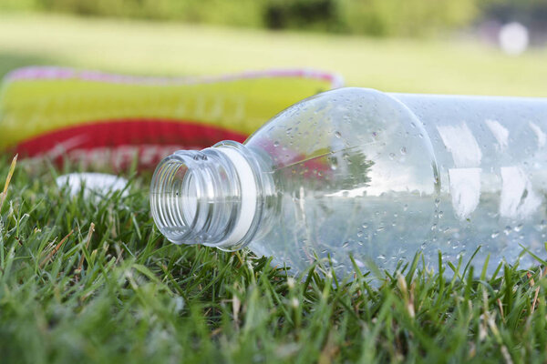 Corby, U.K., June 29, 2019 - empty plastic bottles garbage in the grass, zero waste, save planet.
