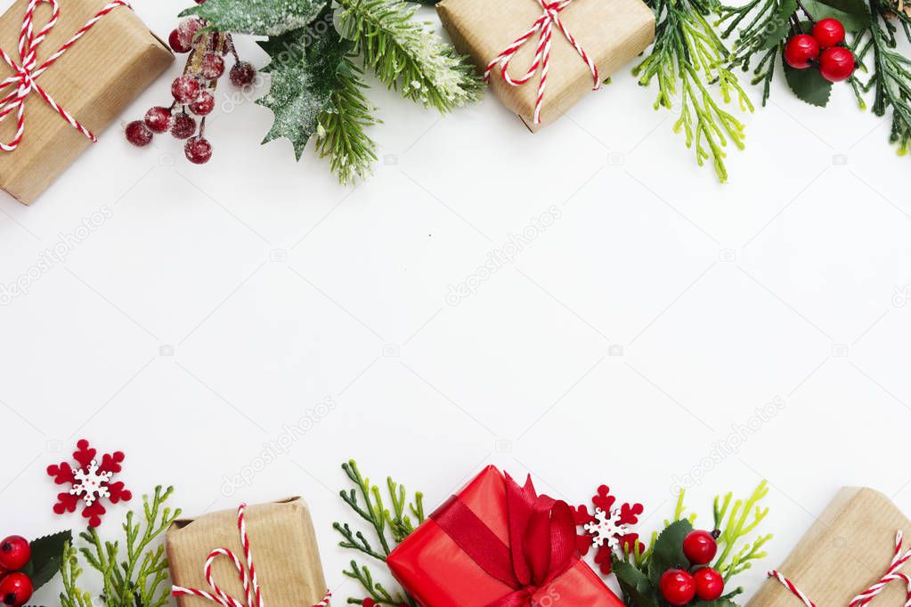 Christmas background, mock up with gift boxes and winter decoration., on white background. Winter holidays. Top view with copy space.