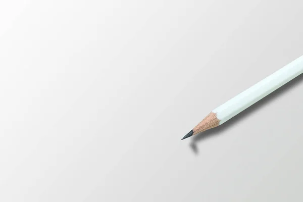 经营理念理念 灰色地板上的白色铅笔 锋利的铅笔头的阴影 — 图库照片