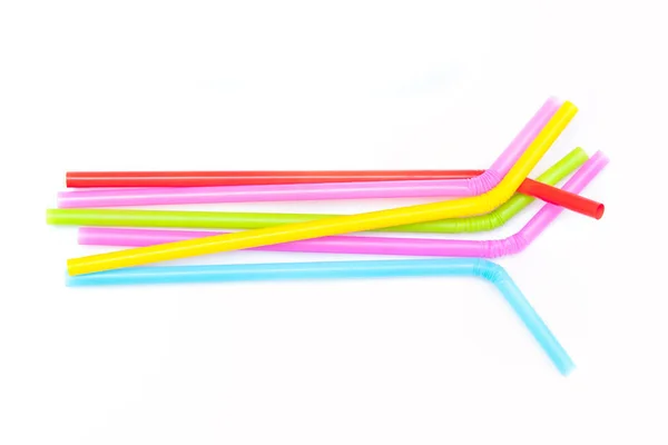 Beyaz Arka Planda Izole Renkli Plastik Içme Pipetleri Yığını — Stok fotoğraf