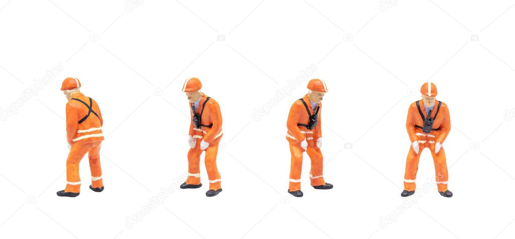 Group of Miniature figurine character as railway shunter standing and posing in posture isolated on white background.