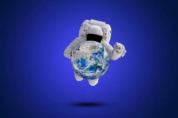 Blue Planet Earth Hand Astronaut Flying Blue Background Elements Image — Stock Photo, Image