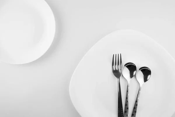 Top View Empty White Food Plates Fork Spoons — Stock Photo, Image