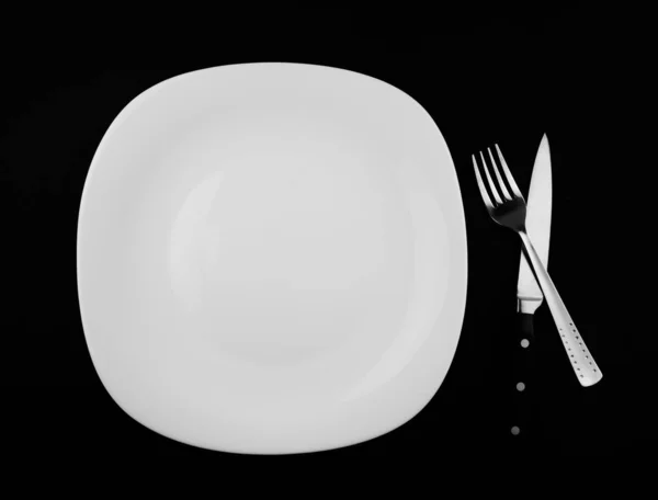 Widok Góry Pusty Biały Jedzenie Płyta Widelcem Nożem — Zdjęcie stockowe