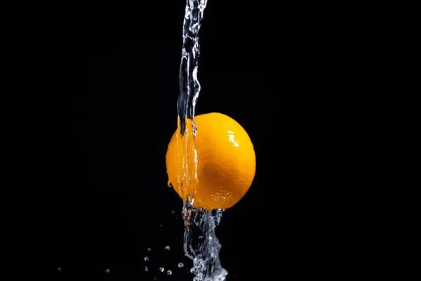 orange splash on black background