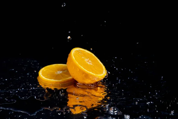 orange splash on black background