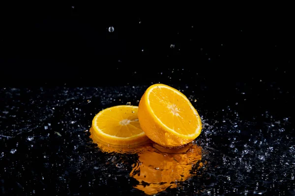 Оранжевый Брызг Черном Фоне — стоковое фото