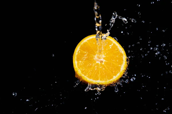 orange splash on black background