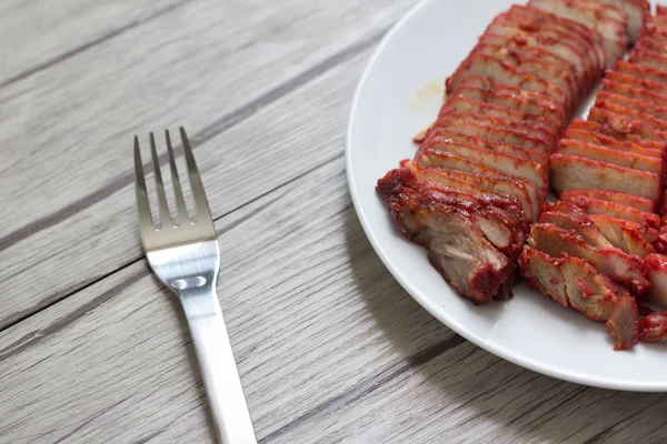 Roasted red pork on white plate — Stock Photo, Image