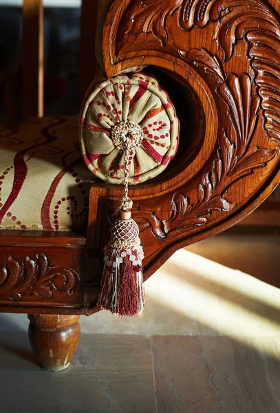 Arabic style decor sofa with tassel close-up woodcarving handmade — Stock Photo, Image